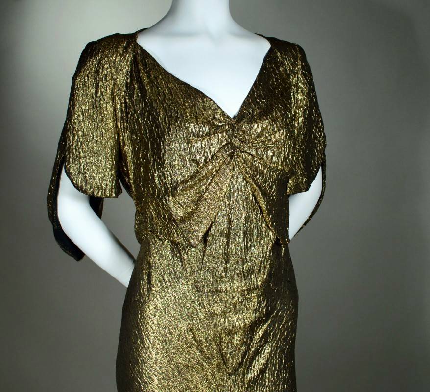 Late 1930’s metallic gold silk lame bias cut Art Deco evening gown.